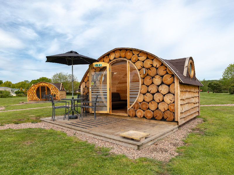 Glamping Holidays at Stratford Parks by the River Avon - Log Pod