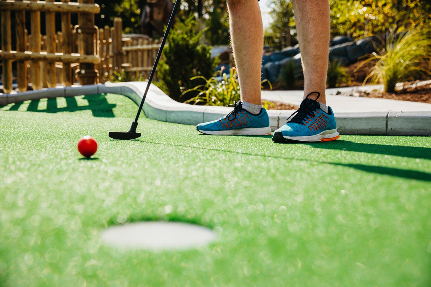 Ma playing mini golf