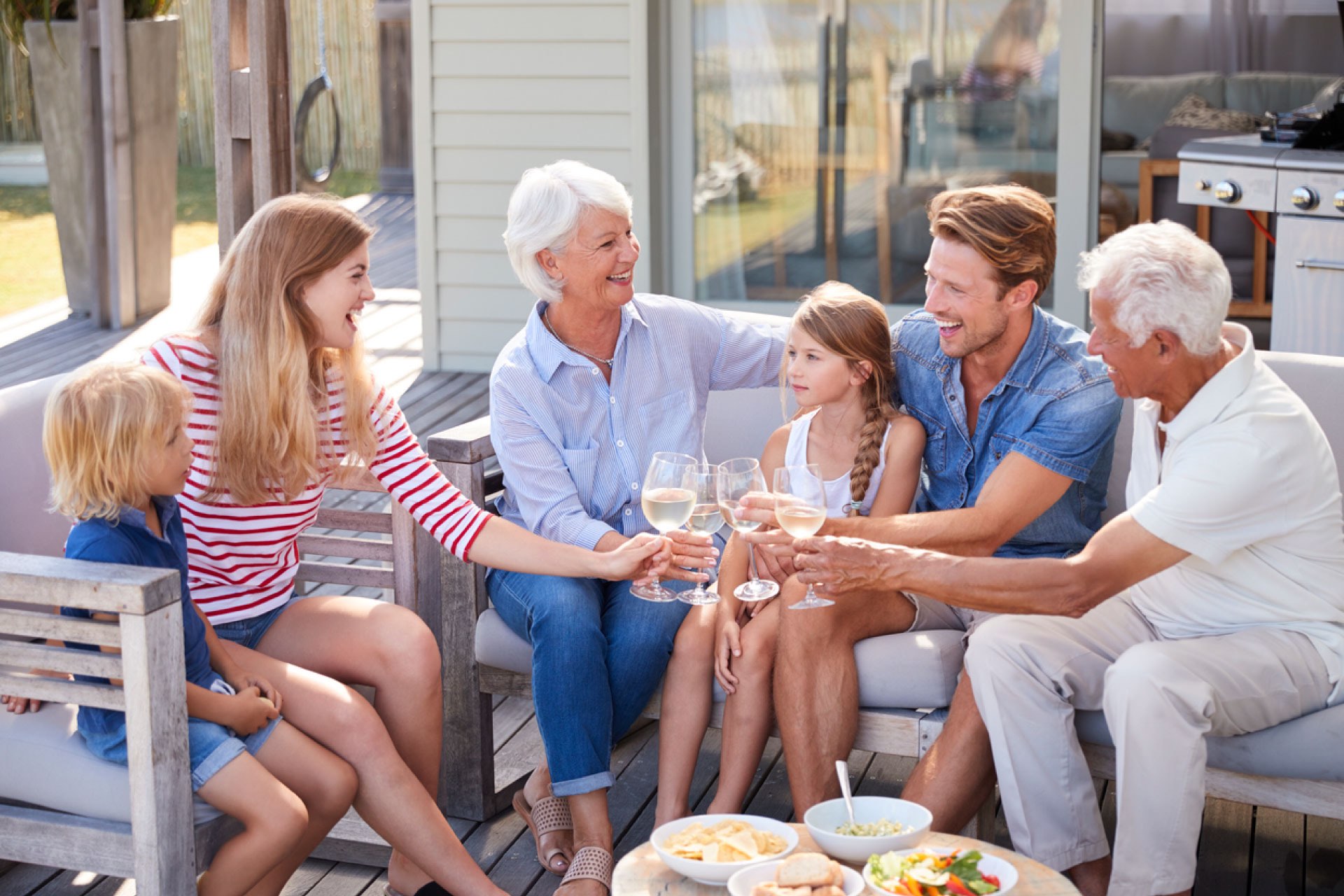 Grandparents enjoying relaxing time with family